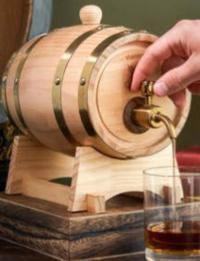 Whiskey barrel dispenser